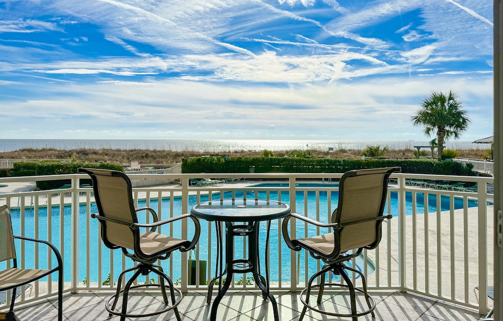 Balcony Overlooking Pool with Ocean View