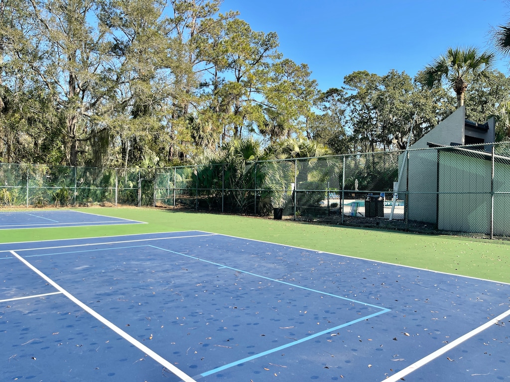 Community Tennis Courts next to the Community Pool
