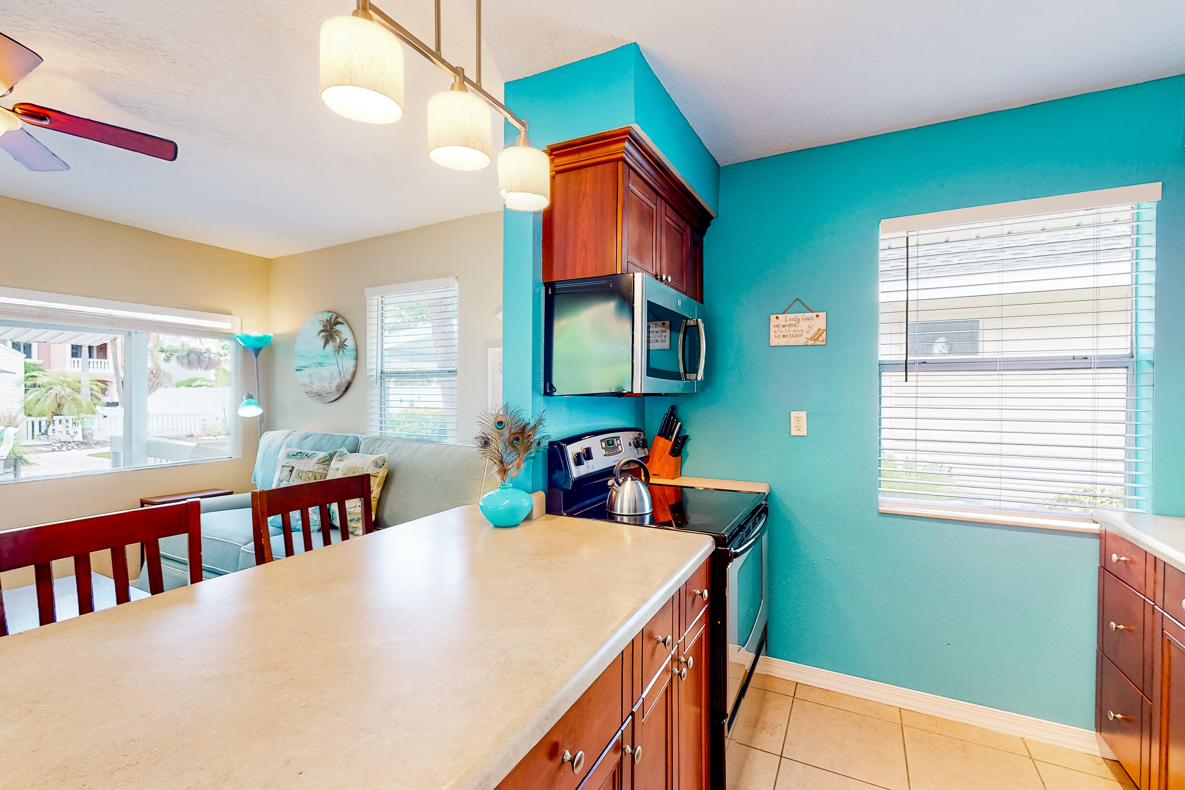 Three cottages with kitchens, AC, an enclosed yard, gas grill, & a washer/dryer