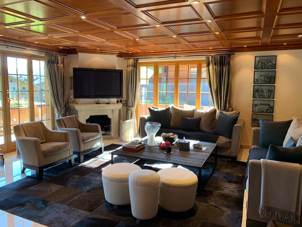 The beautiful sitting area in the living room is situated in front of the balcony, offering wonderful views.