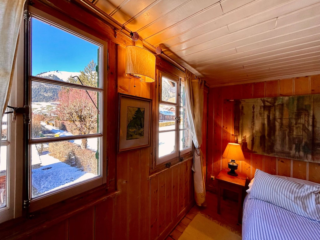snow covered mountain views from bedroom 1 