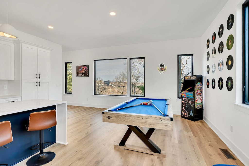 Explore your Nashville retreat—stylish game room with billiards, arcade games, and skyline views! Perfect for bachelorette parties and family reunions. Make unforgettable memories in Music City!