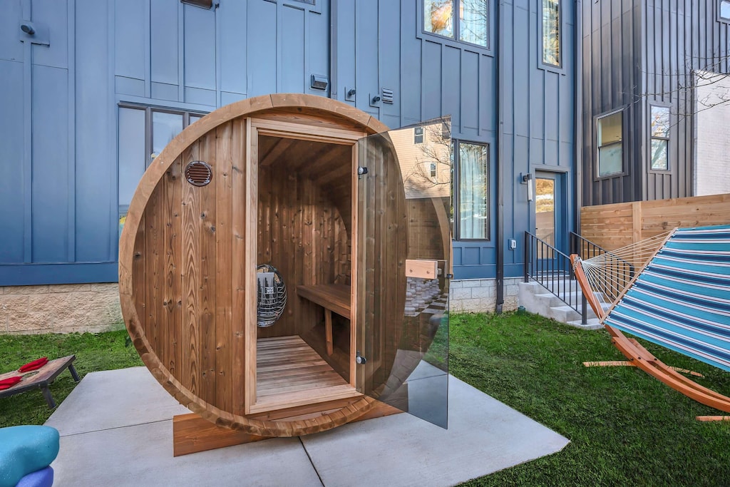 Unwind in style at this luxurious Nashville rental with a unique outdoor barrel sauna, ideal for bachelorette parties or family reunions. Enjoy plush spaces and chic amenities in the heart of Music City!
