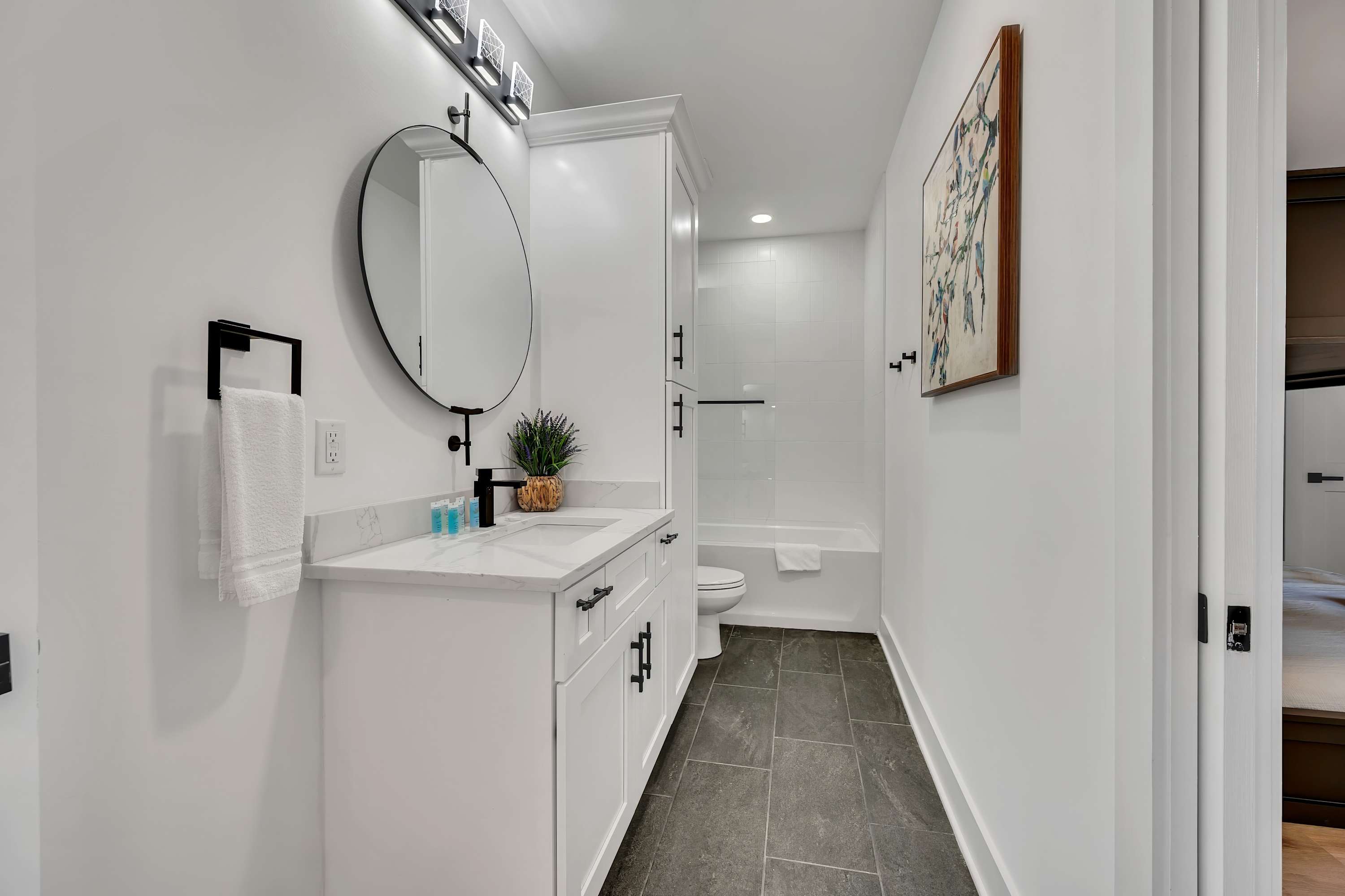 Explore this elegant Nashville bathroom oasis, where modern design meets functionality. Perfect for family reunions or bachelorette getaways, this spacious retreat features luxurious finishes for a refreshing start to your day. Enjoy the sophisticated touches throughout your premium vacation home. Explore this elegant Nashville bathroom oasis, where modern design meets functionality. Perfect for family reunions or bachelorette getaways, this spacious retreat features luxurious finishes for a refreshing start to your day. Enjoy the sophisticated touches throughout your premium vacation home.