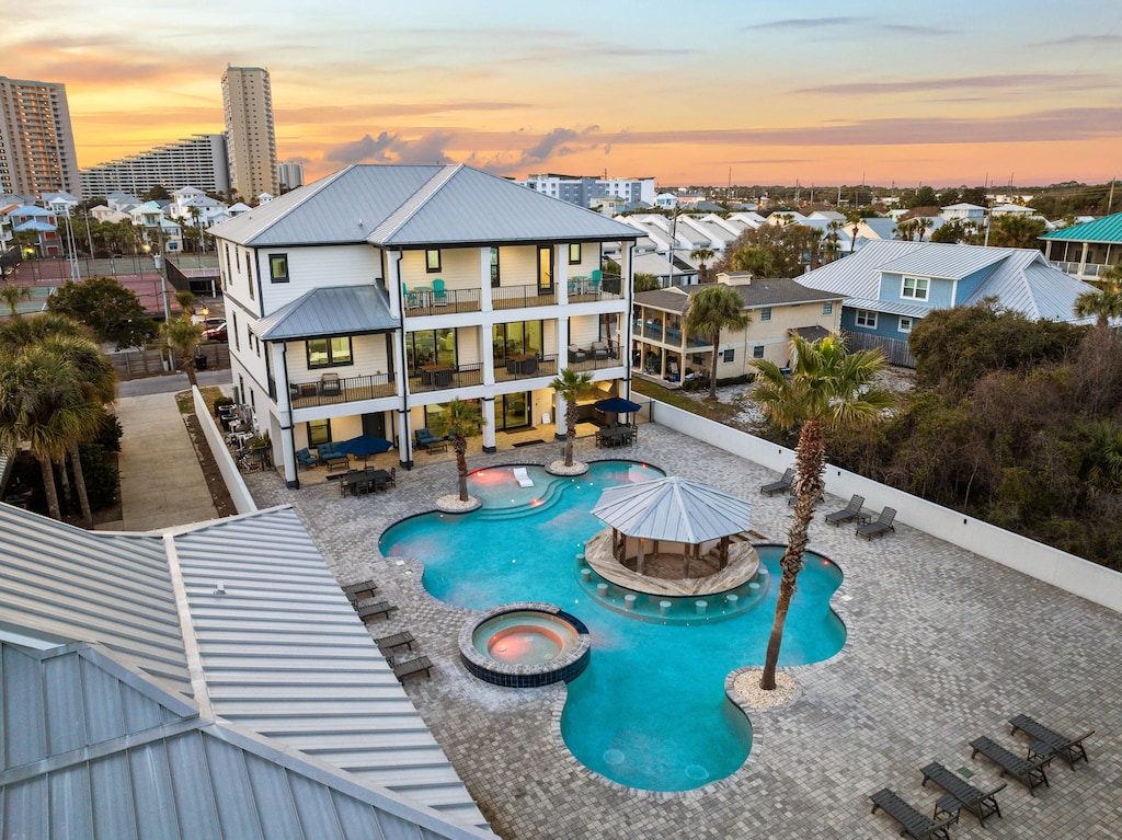Unwind in the pool or spa and soak in the beauty of this stunning backyard.