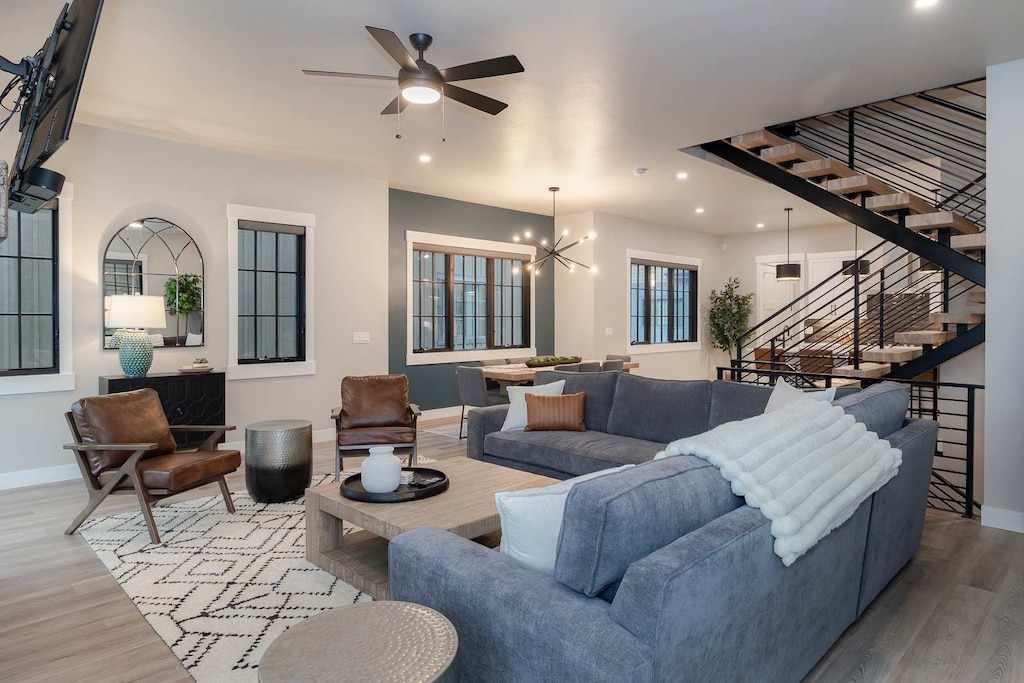 - Unwind in the spacious, open-concept living area, where you can relax on the comfortable sofa and enjoy quality time with friends and family. This inviting space is designed for memorable moments and shared experiences.