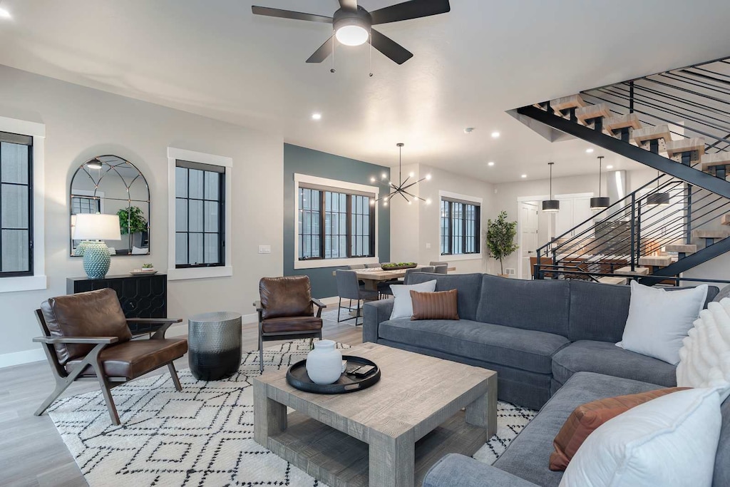 - Settle into the warm and inviting living room, a space crafted for connection and perfect for sharing moments with loved ones. This cozy sanctuary is designed for comfort and quality time together.