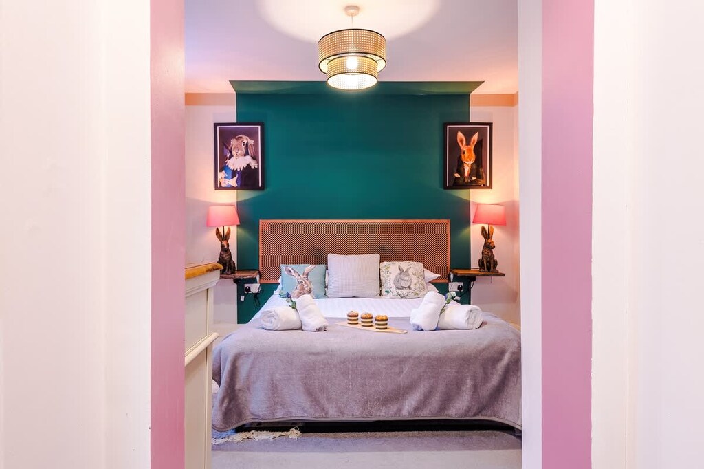 The master bedroom benefits from a comfortable king-size bed, TV and Coffee Machine.