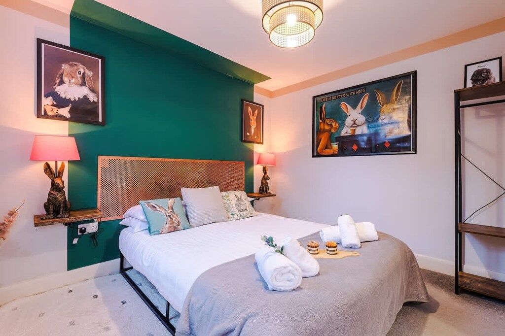 The master bedroom benefits from a comfortable king-size bed, TV and Coffee Machine.