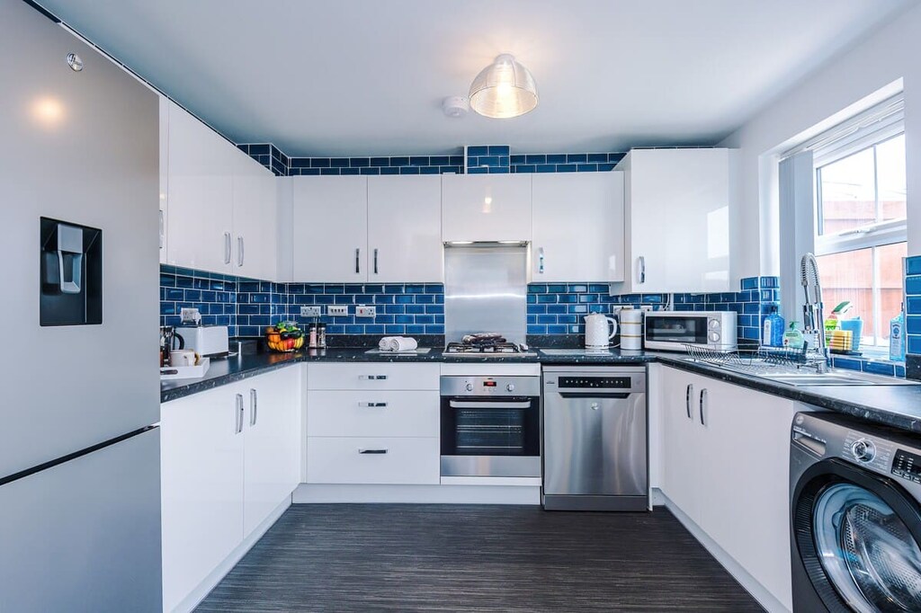 The open-plan kitchen/diner benefits from a gas hob, fridge/freezer and all the necessities needed for a long or short stay in Crewe.