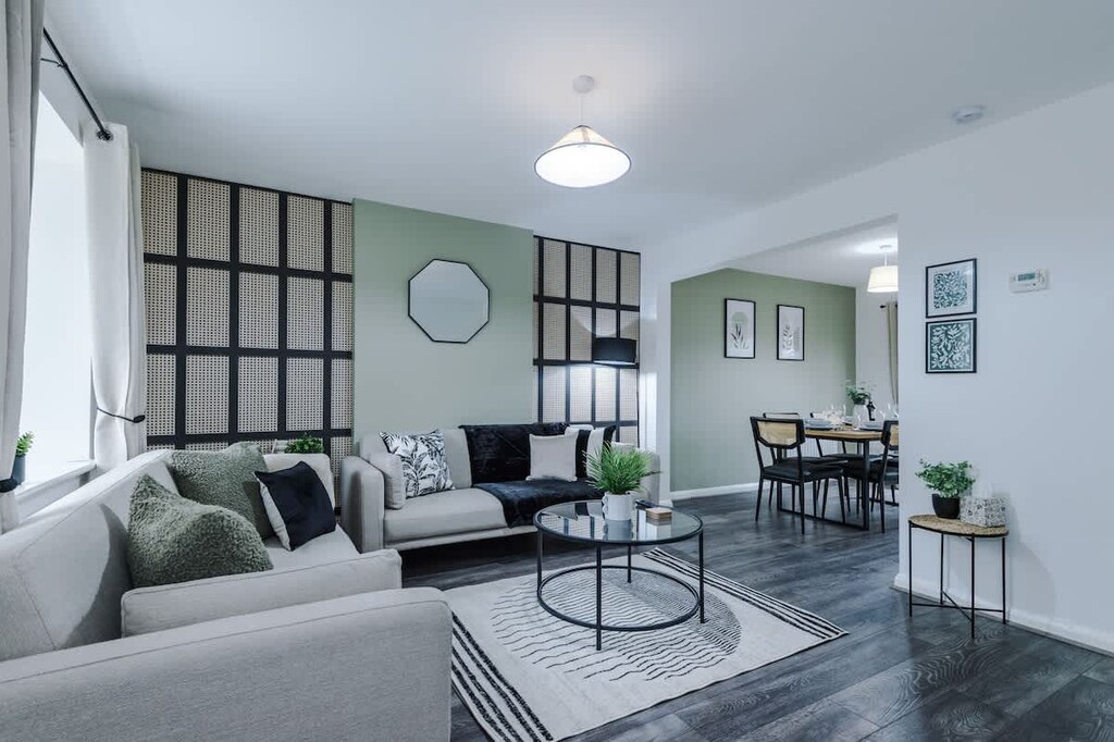 The spacious living space benefits from a 40-inch smart TV and plenty of space to sit down and relax.