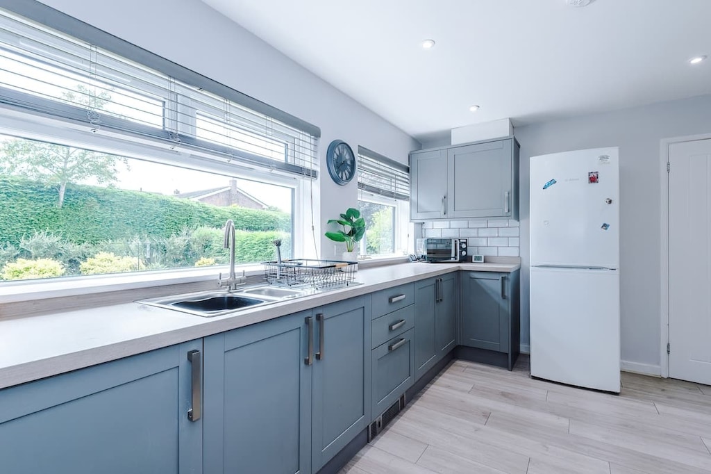 The fully equipped kitchen has everything you need for a long or short stay in Wrexham.