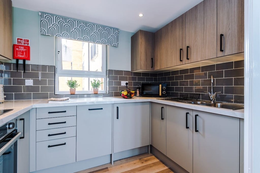 The fully equipped kitchen has everything you need for a short or long-term stay whilst away in Manchester.