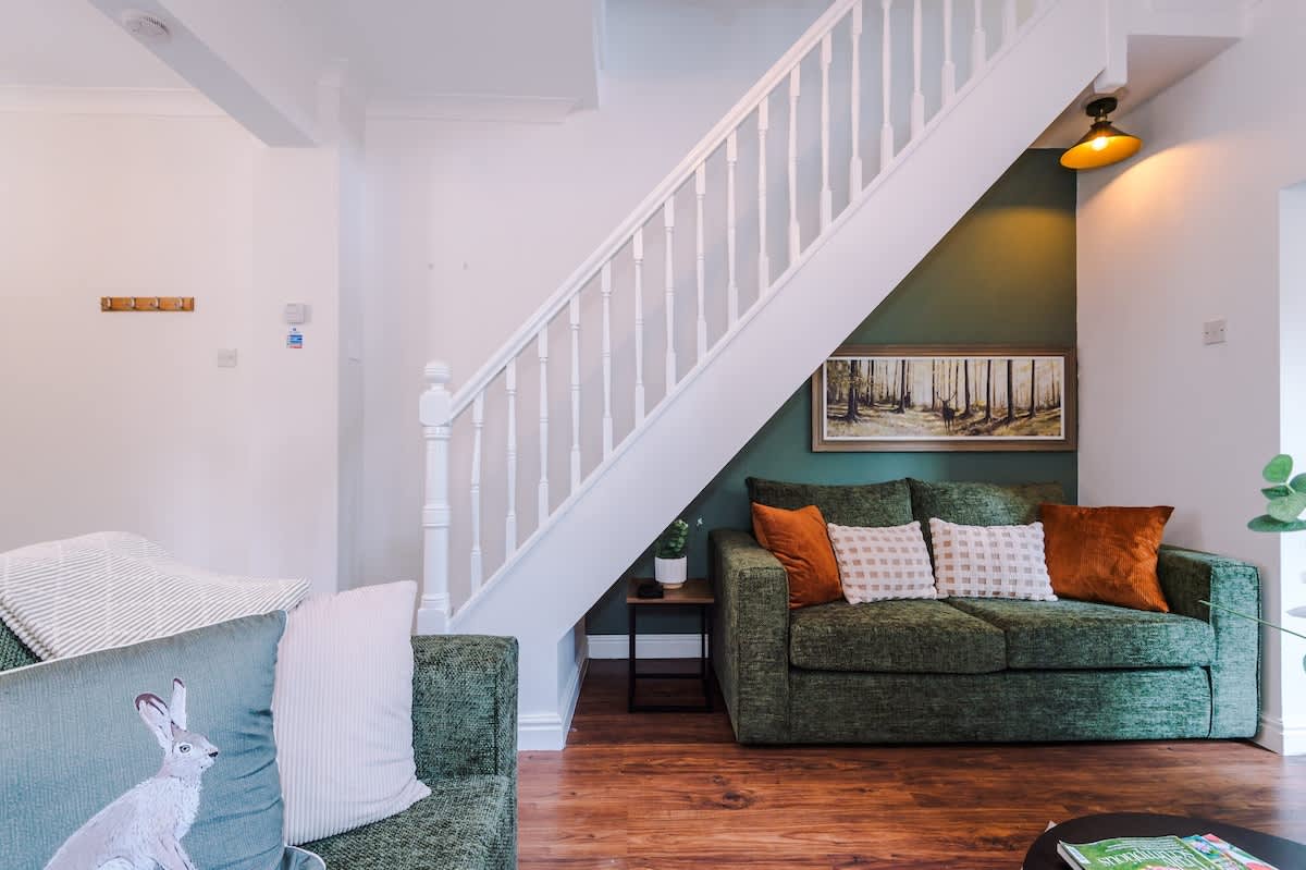 The spacious living room benefits from a double sofa-bed, Smart TV with Netflix and plenty of space to sit down after a long day exploring Chester.