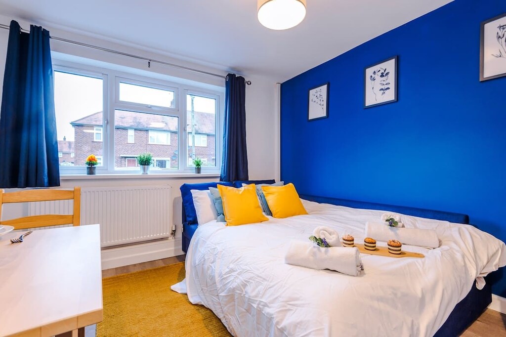 The open plan living room benefits from a double sofa bed, 4 seater dining table and fully equipped kitchen.