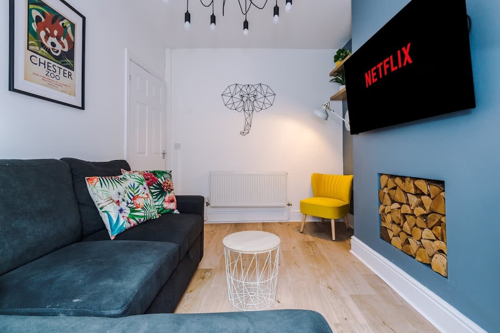 The modern living room benefits from a large corner sofa which can be converted into a double sofa bed, a 40-inch SMART TV with Netflix and plenty of space to sit down and relax.