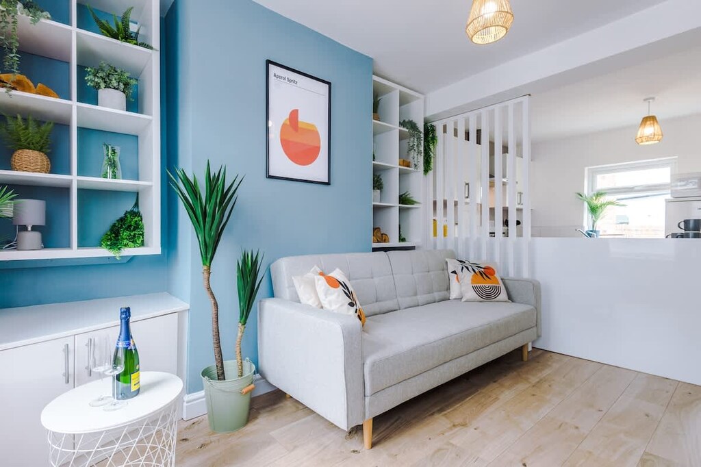 Large open plan living/dining/kitchen area boasting a 40 inch Smart TV with Netflix.
