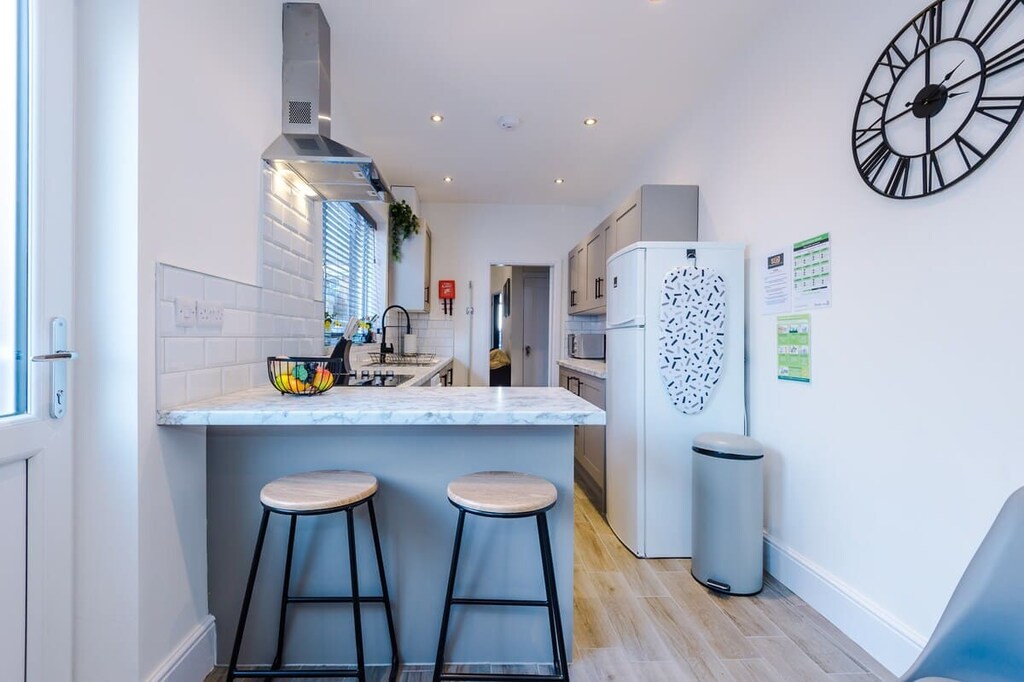 The fully equipped open plan kitchen/dining area has everything you need for a short and long term stay in Crewe. 