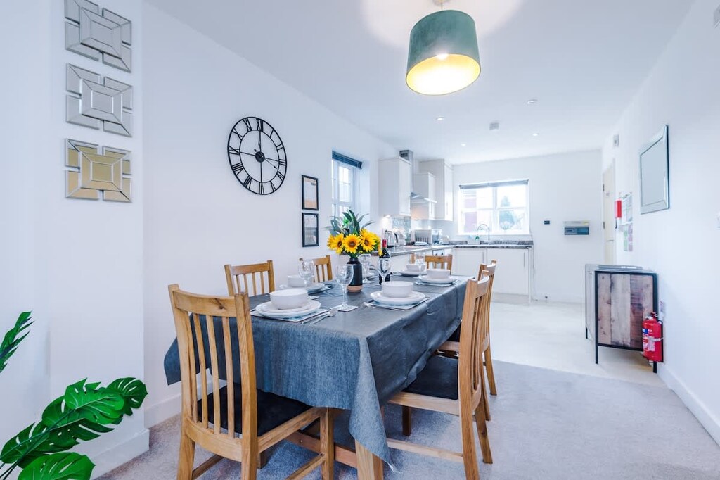 Open plan Dining area benefitting from a dining table that can seat up to 8 guests.