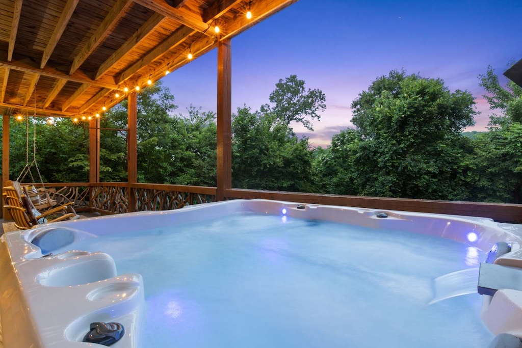 Golden hour soak. Slip into the hot tub by the deck at twilight and watch the sky fade from gold to stars — pure mountain magic.

