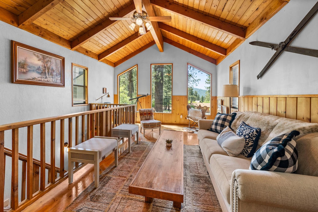 Upstairs Living Room with beautiful windows looking out on peekaboo lake views