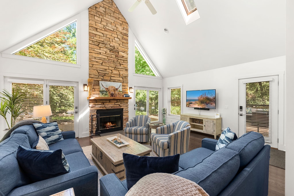 Vaulted ceilings, plush seating, and that perfect fireplace glow.