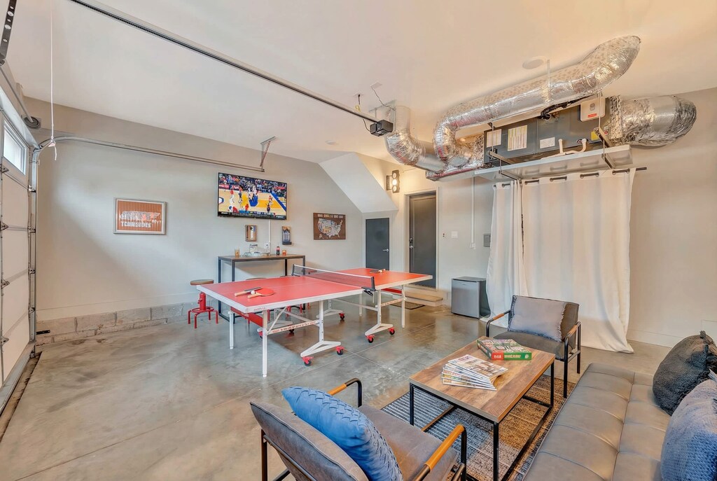 Enjoy your private game room on a Nashville getaway! Perfect for ping pong or watching the big game, this stylish space is ideal for bachelorette parties and family reunions. Create unforgettable memories in this luxurious rental!