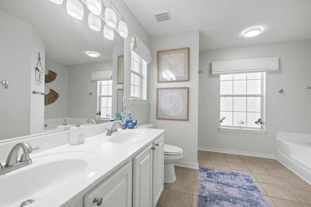 Private Bathroom #1 has a jack-and-jill vanity for Bedroom #1.