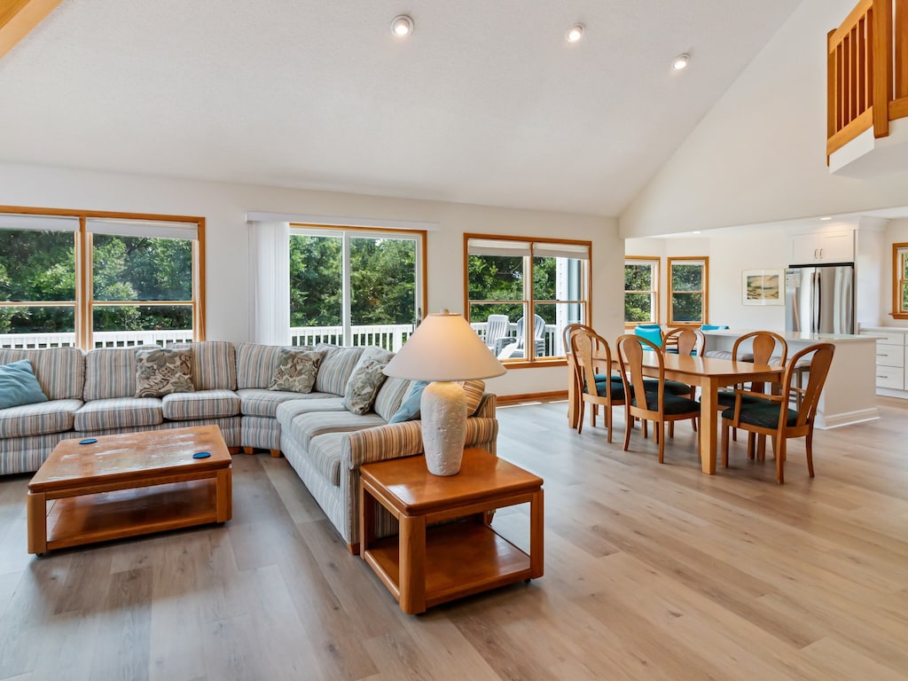 Effortlessly relax in the spacious Great Room with cathedral ceilings.