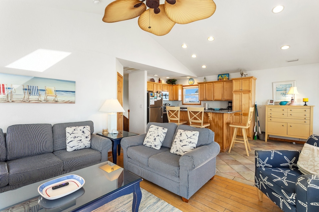 Enjoy unbeatable views of the ocean from the spacious Living Area with sliding glass doors out onto the Furnished Sun Deck.