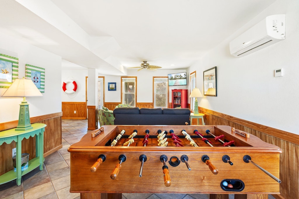 Have some fun in the Game Room with a Foosball Table and a downstairs Living Area.