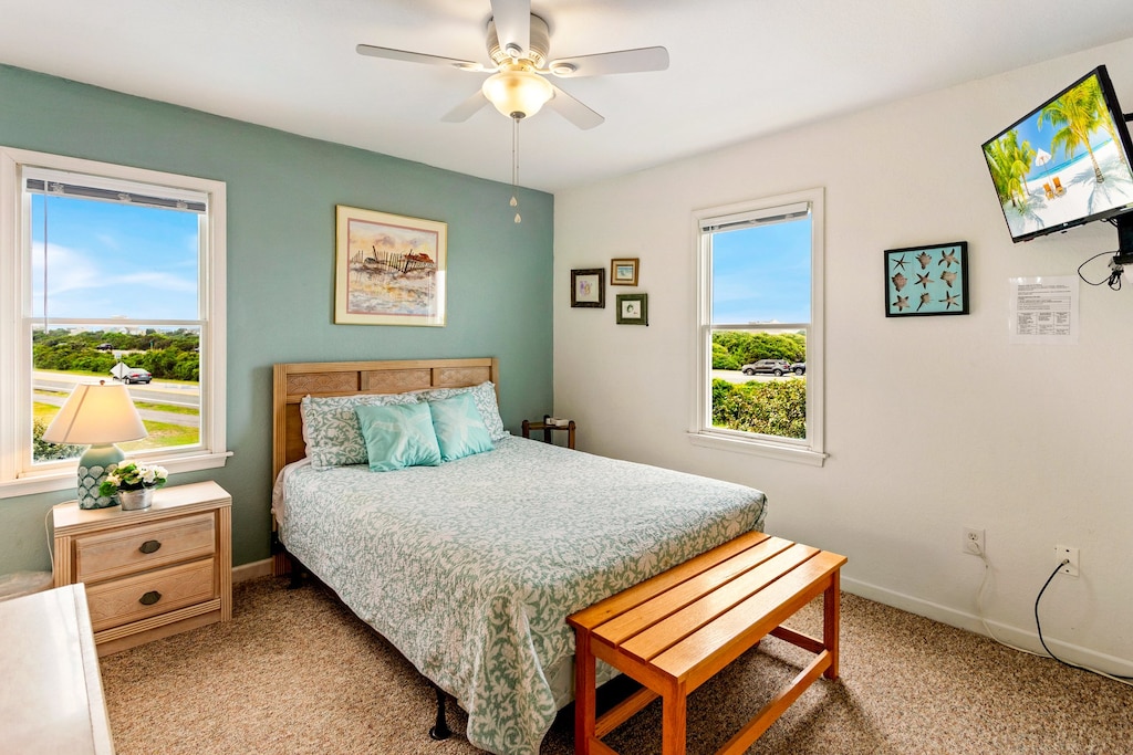 The Queen Master Bedroom boasts a TV for convenience.