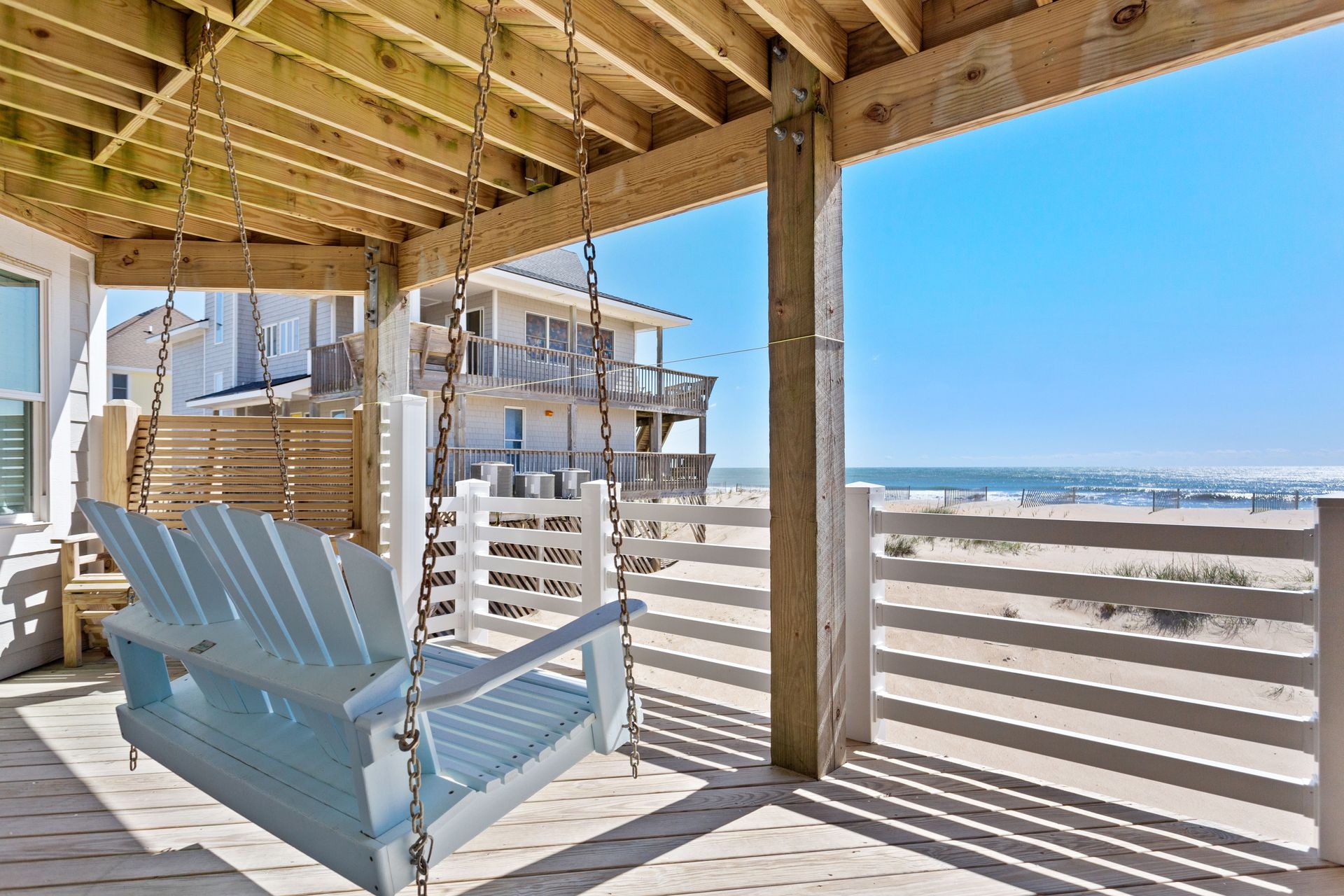 The oceanfront swing is the ideal spot for an early morning cup of coffee.