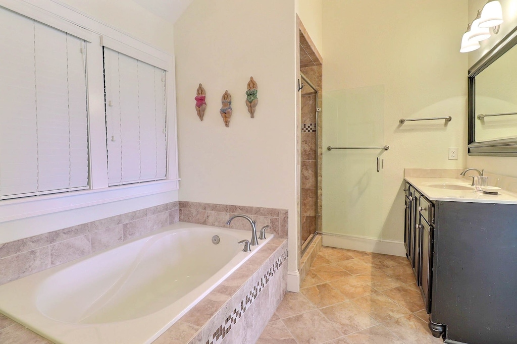 The top level boasts a King Bedroom with an elegant bathroom and soaking tub.