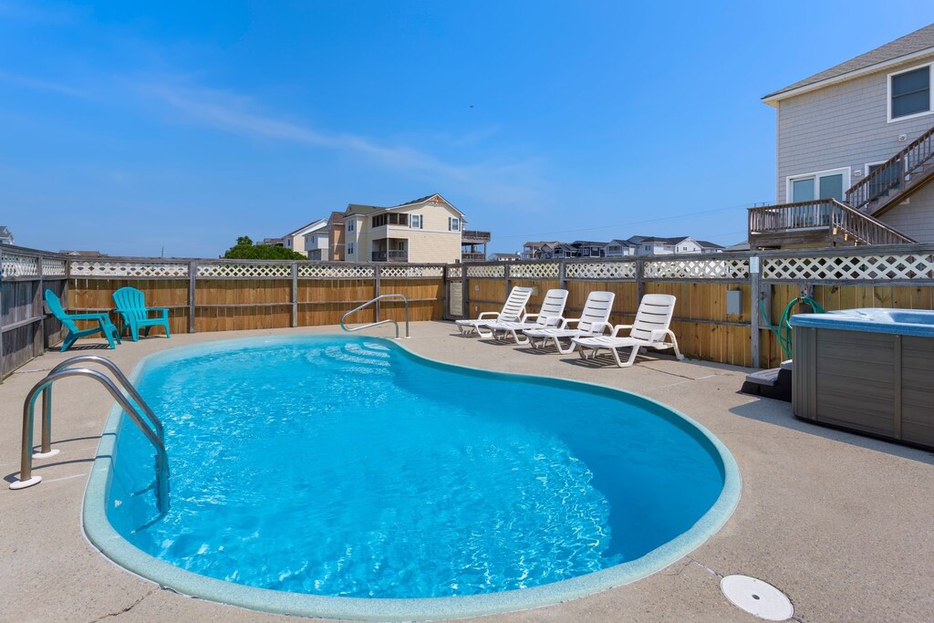 Take a break in the Private Pool and bubbly Hot Tub out back!