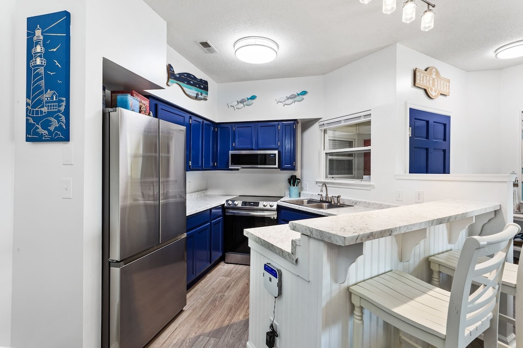 Prep a delicious meal in the modern Kitchen to enjoy at the Counter Bar or the Dining Area together.