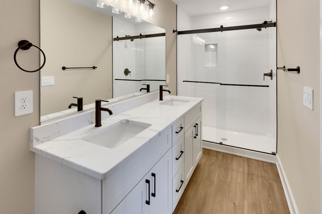 The Full Bathroom with a Double Vanity and Glass Shower offers convenience for everyone during your stay.