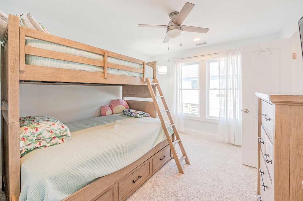 The Main-Level Bedroom with a Pyramid Bunk is the perfect spot for getting the kids settled into their own space.