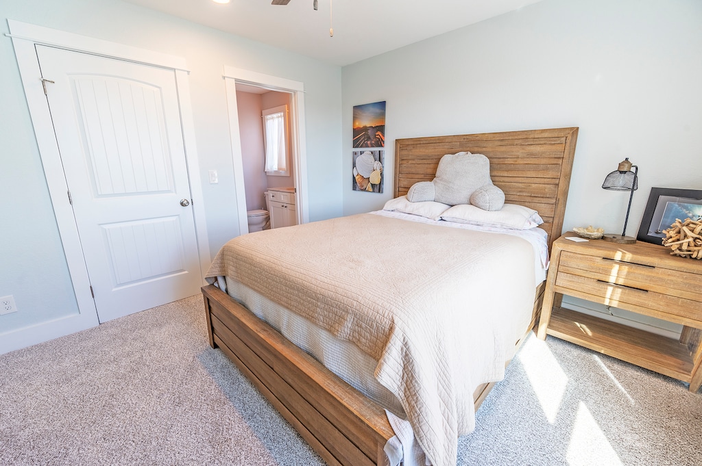 The Main-Level Queen Bedroom  with a Shared Bathroom is the ideal retreat during your stay.