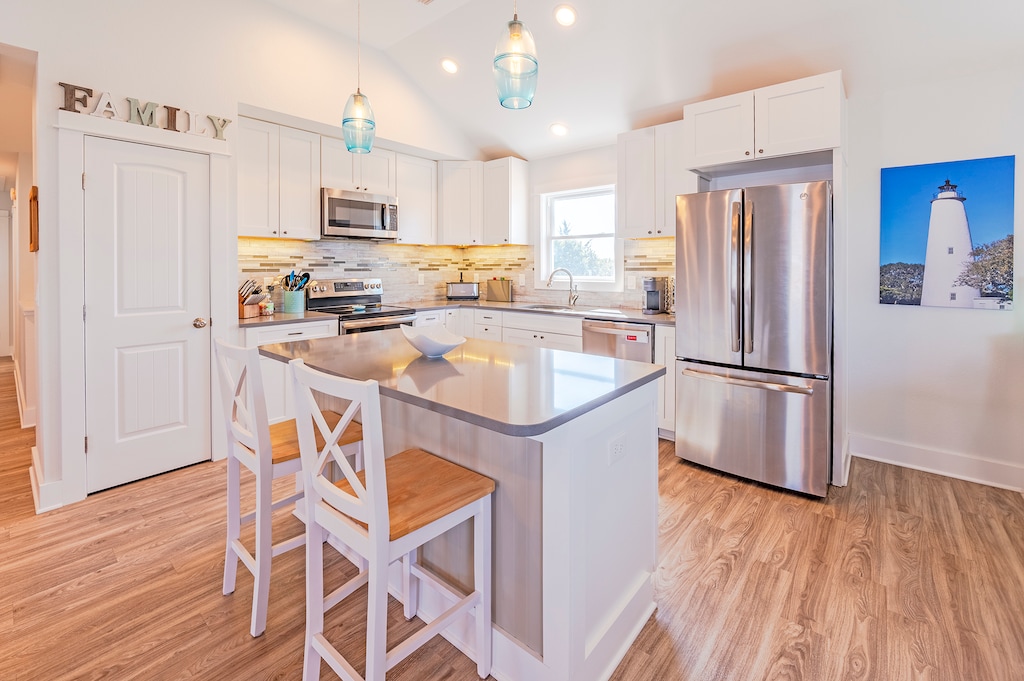 Make your way to the Kitchen Island for prep space or additional seating for a quick breakfast or snack!