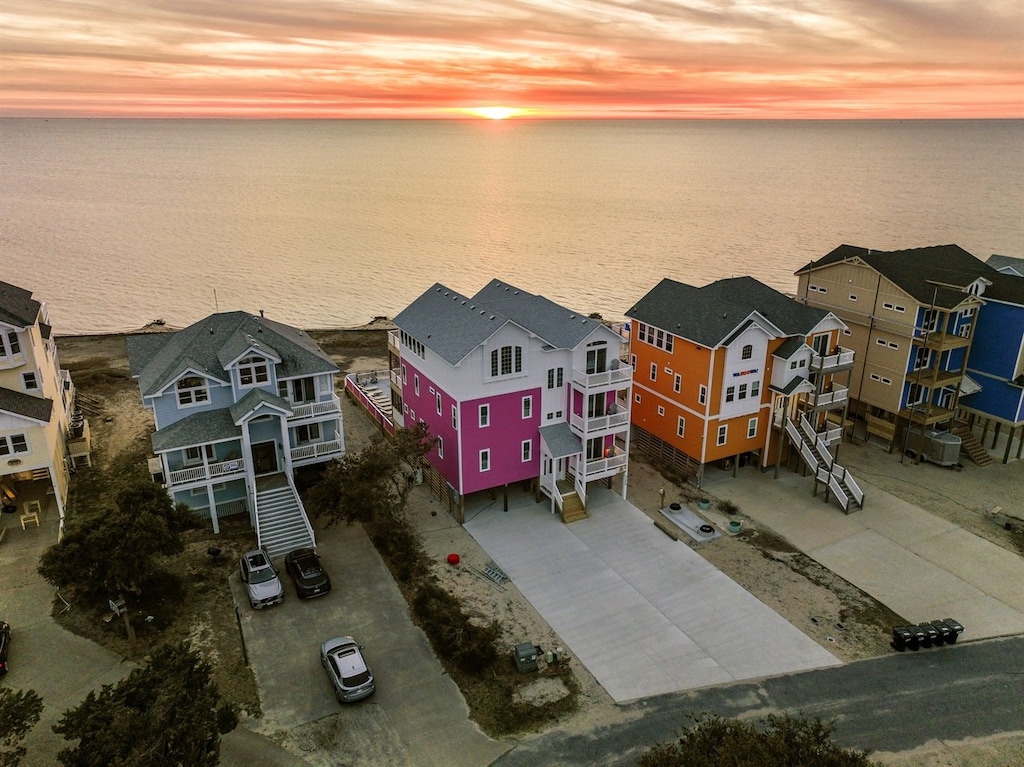 Welcome to Sounds Sea'rious, a gorgeous 10-bedroom, 13-Bathroom (11 full, 2 half) soundfront retreat in the heart of Avon with sunset views and watersports access.
