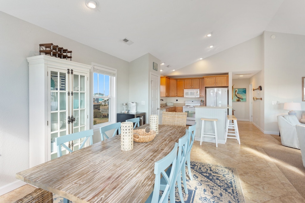 The well-lit Dining Area is perfect for enjoying a meal together or settling down for family game night.