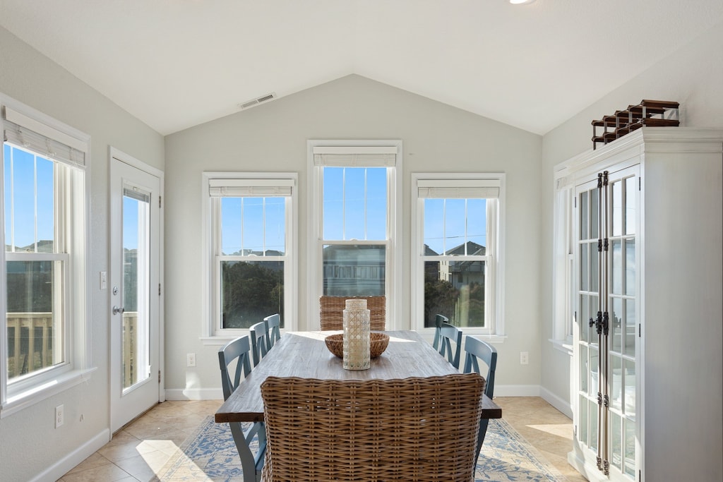 The well-lit Dining Area is perfect for enjoying a meal together or settling down for family game night.