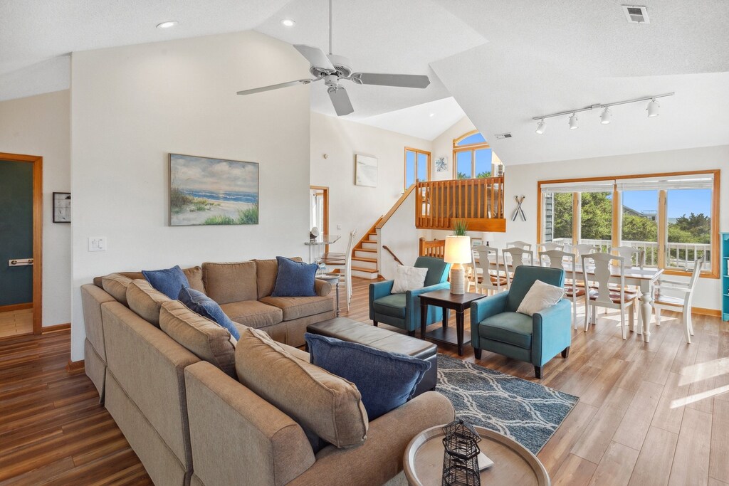 Gather in the open-concept Living Area on the top level to share stories of the day,