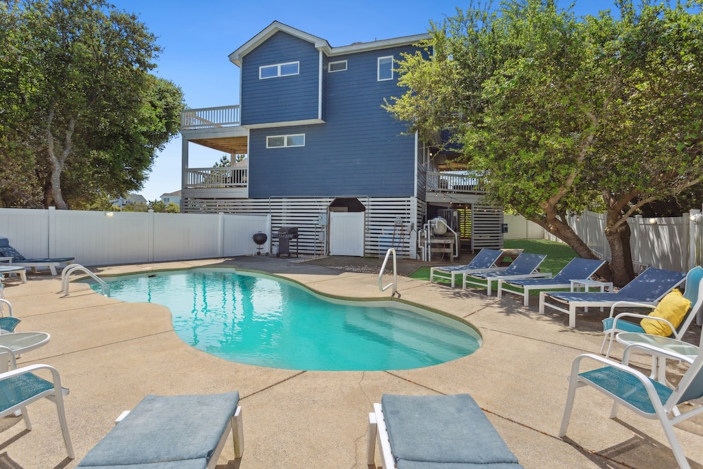 This dog-friendly home (2 dogs max) offers the perfect blend of comfort, convenience, and charm with a Private Pool, bubbly Hot Tub, and Screened-In Porch for cool evenings under the stars.