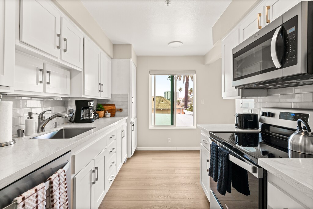 Prepare meals with ease in the sleek, compact kitchen—perfect for fueling up between adventures.