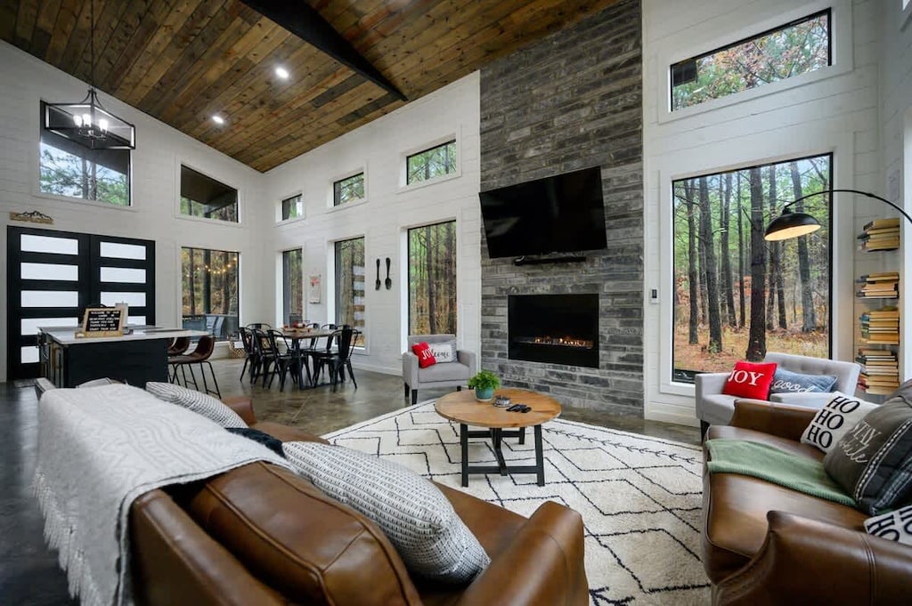 Living area with comfy seating and a fireplace