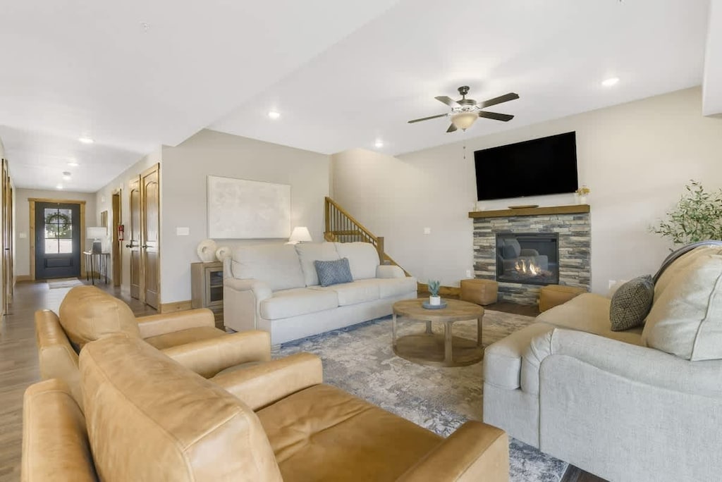 Cozy living area with fireplace and TV