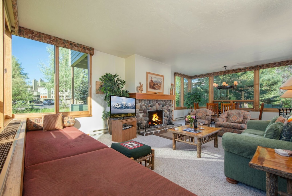 Living Room with Wood Fireplace and Window Beds