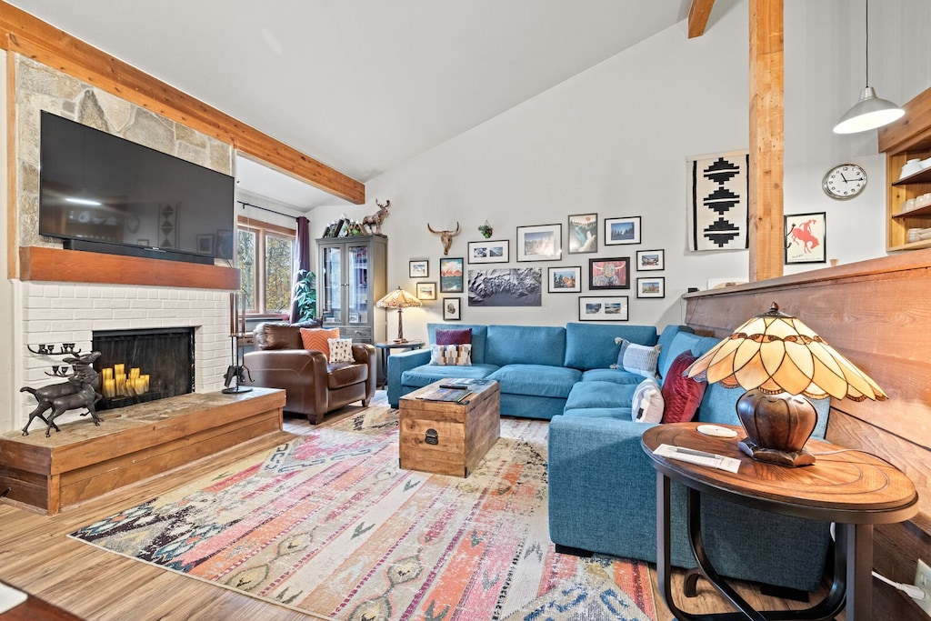 View of Living Area (Fireplace is non-functional and features remote operated decorative candles).
